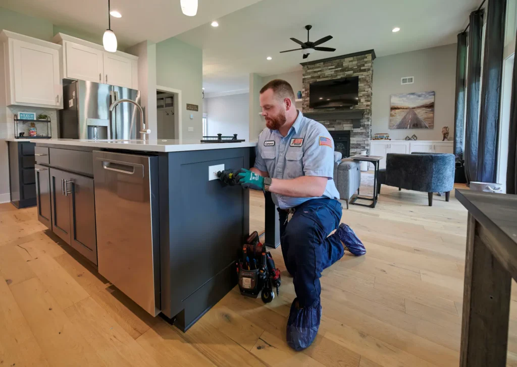 electrician installing outlet