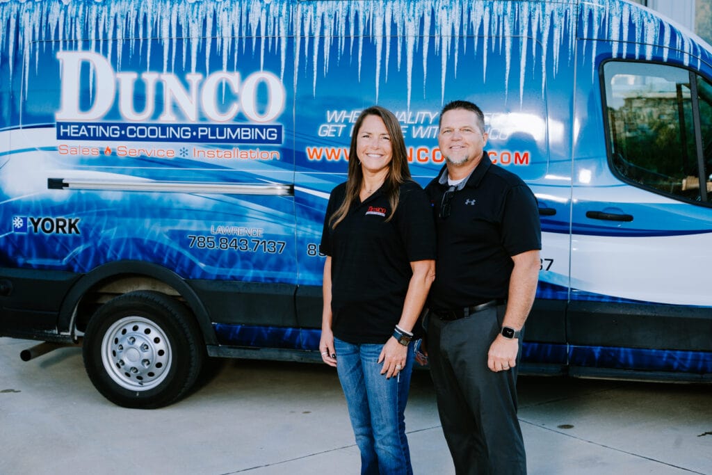 Image of Wayne and Diane Duncan in front the Dunco Heating and Cooling van