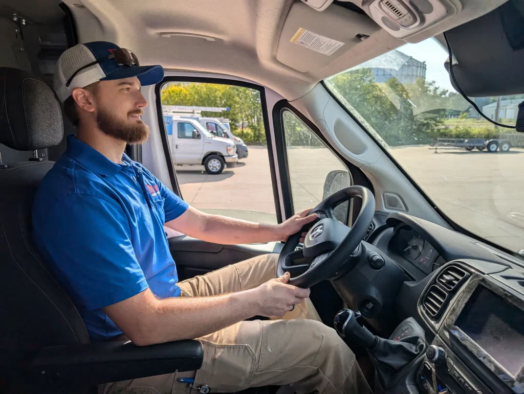 Dunco electrician driving van